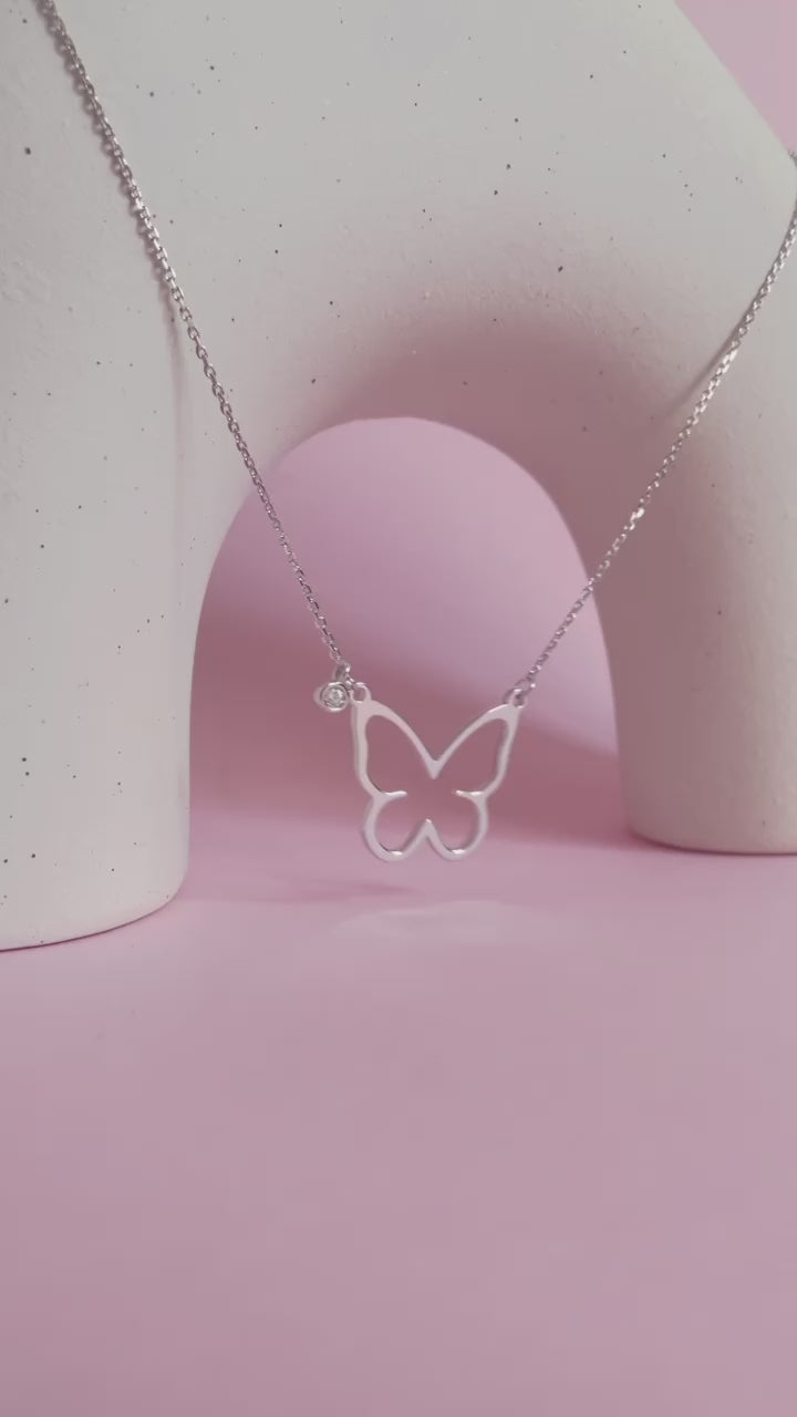 Open Butterfly Necklace, Silver, video, Indulge yourself or surprise a loved one with this stunning butterfly necklace. This exquisite accessory enhances any outfit. ,$110.00