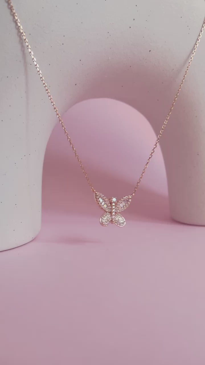 Shimmering Butterfly Necklace, Rose Gold, video, Indulge yourself or surprise someone special with this stunning necklace that elevates any outfit with its touch of elegance.,$135.00